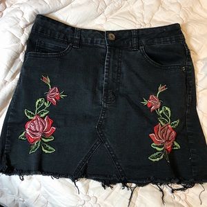 Black denim skirt w/ rose stitch detail